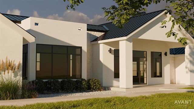 400 Shale, Horseshoe Bay, TX 78657 - rear view of house featuring metal roof, a standing seam roof, and stucco siding