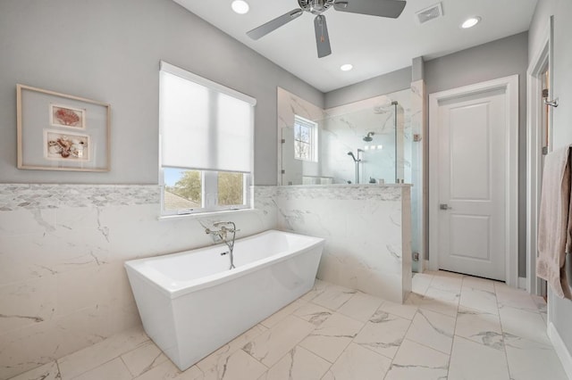 full bathroom featuring a freestanding tub, a marble finish shower, visible vents, ceiling fan, and marble finish floor