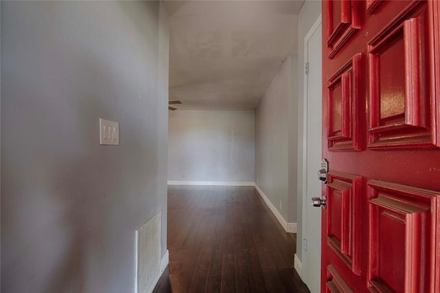 311 August St, Schulenburg, TX 78956 - foyer with dark wood-style floors and baseboards
