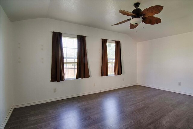 311 August St, Schulenburg, TX 78956 - empty room featuring a ceiling fan, baseboards, dark wood-style floors, and lofted ceiling