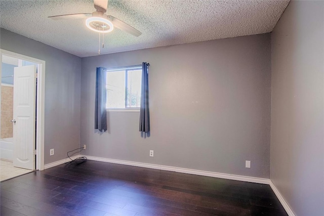 311 August St, Schulenburg, TX 78956 - empty room with hardwood / wood-style flooring, a ceiling fan, and a textured ceiling