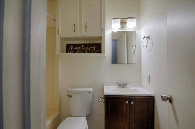 311 August St, Schulenburg, TX 78956 - bathroom featuring toilet, vanity, a bathtub, and walk in shower
