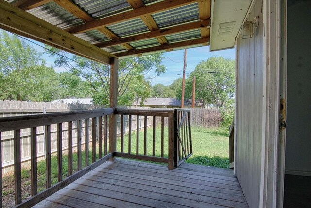 311 August St, Schulenburg, TX 78956 - wooden terrace with a yard and a fenced backyard