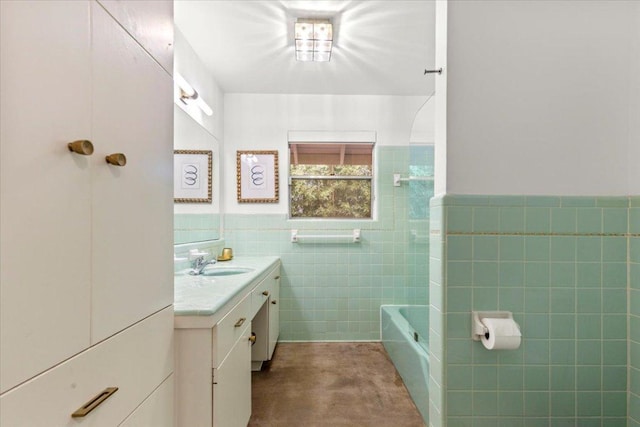 3106 Maywood Ave, Austin, TX 78703 - full bathroom featuring tile walls, vanity, and a wainscoted wall