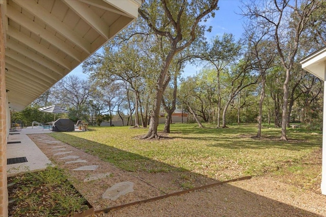 3106 Maywood Ave, Austin, TX 78703 - view of green lawn featuring a patio