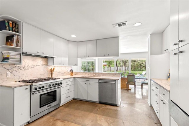 3106 Maywood Ave, Austin, TX 78703 - kitchen with stainless steel appliances, finished concrete flooring, a sink, backsplash, and white cabinets