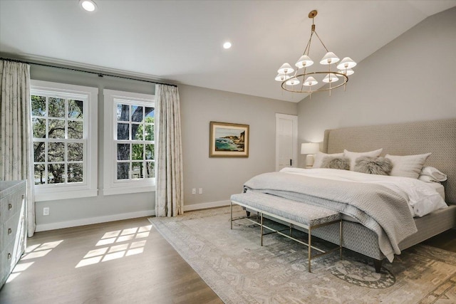 1710 Mccall Rd, Austin, TX 78703 - bedroom featuring wood finished floors, a chandelier, recessed lighting, and lofted ceiling