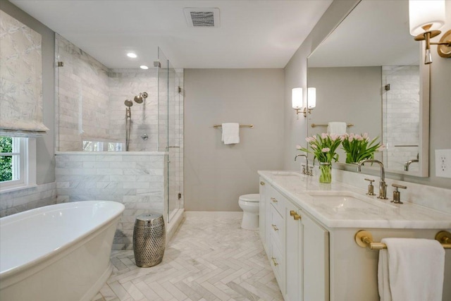 1710 Mccall Rd, Austin, TX 78703 - bathroom featuring a soaking tub, a stall shower, and double vanity