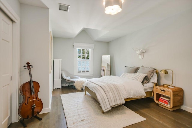 1710 Mccall Rd, Austin, TX 78703 - bedroom with wood finished floors and a closet