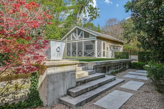 1710 Mccall Rd, Austin, TX 78703 - rear view of house with a sunroom