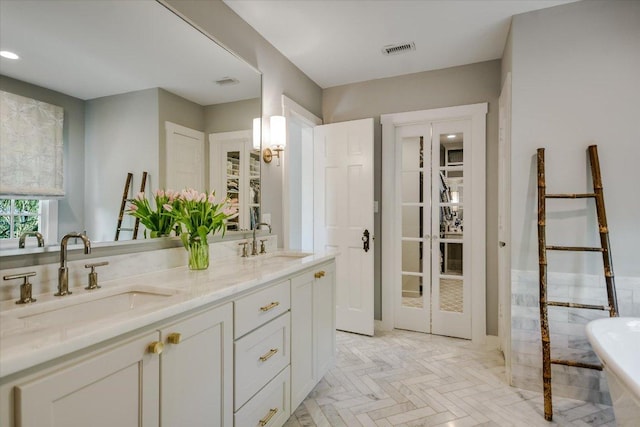 1710 Mccall Rd, Austin, TX 78703 - full bath featuring a freestanding bath and double vanity