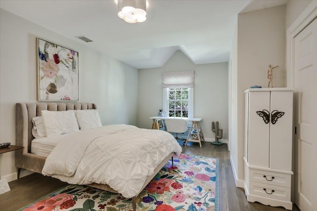 1710 Mccall Rd, Austin, TX 78703 - bedroom with dark wood-style flooring and baseboards