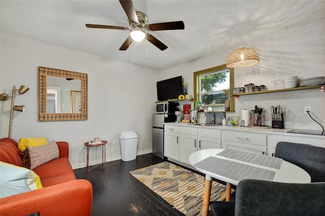 interior space with white cabinets, open shelves, a sink, ceiling fan, and dark wood-type flooring