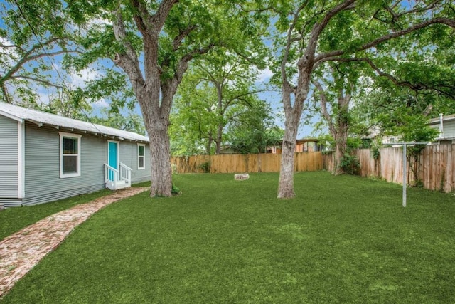 view of yard featuring a fenced backyard