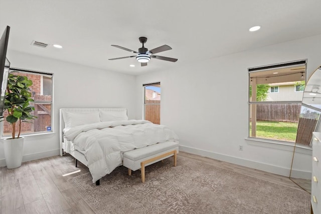 13436 Moscow Trl, Austin, TX 78729 - bedroom featuring wood finished floors, baseboards, recessed lighting, and ceiling fan