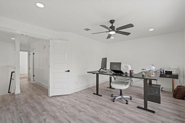 13436 Moscow Trl, Austin, TX 78729 - home office with wood finished floors, a ceiling fan, recessed lighting, and baseboards