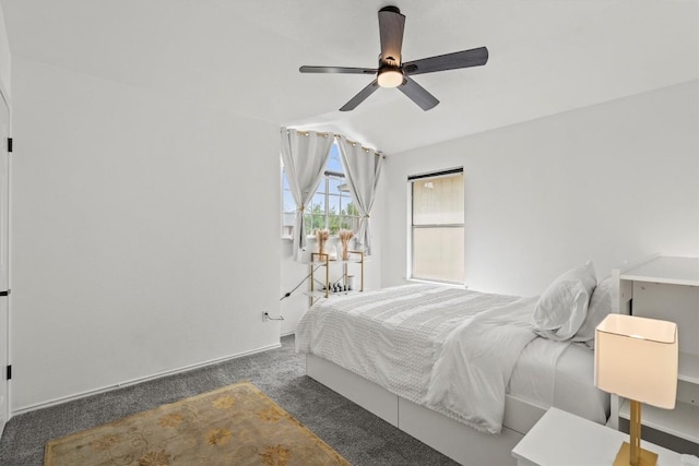 13436 Moscow Trl, Austin, TX 78729 - bedroom featuring carpet floors, vaulted ceiling, and ceiling fan