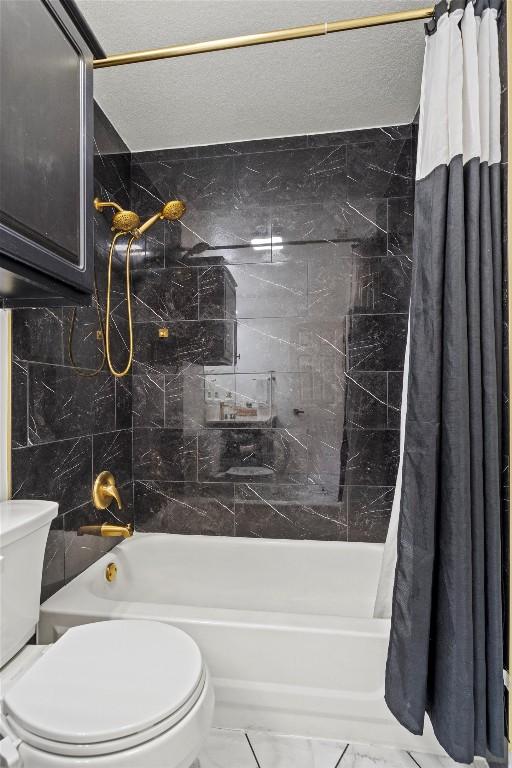 13436 Moscow Trl, Austin, TX 78729 - full bathroom with toilet, shower / bath combo with shower curtain, and marble finish flooring
