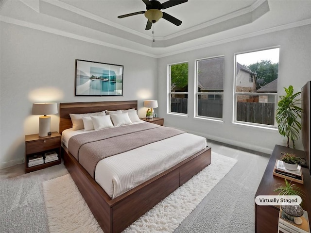 1985 Canyon Sage Path, Round Rock, TX 78665 - carpeted bedroom with a raised ceiling, ornamental molding, multiple windows, and ceiling fan