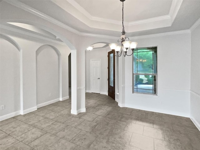 1985 Canyon Sage Path, Round Rock, TX 78665 - unfurnished dining area featuring a raised ceiling, arched walkways, a chandelier, and ornamental molding