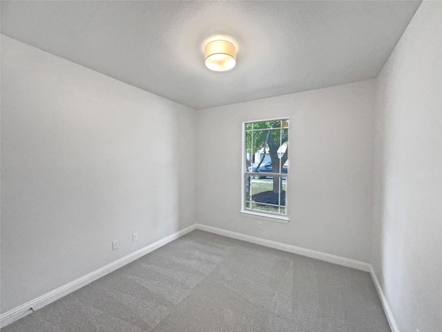 1985 Canyon Sage Path, Round Rock, TX 78665 - carpeted spare room with baseboards