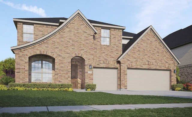 925 Old Garden Rd, Leander, TX 78641 - view of front of property featuring brick siding, a front yard, and concrete driveway