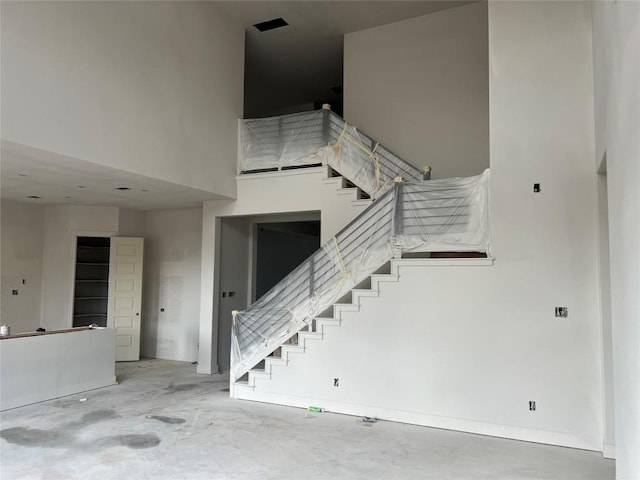925 Old Garden Rd, Leander, TX 78641 - stairway featuring a high ceiling and concrete floors