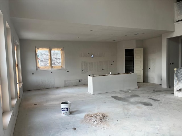 925 Old Garden Rd, Leander, TX 78641 - unfurnished living room with unfinished concrete flooring