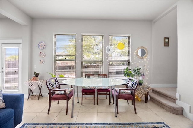 13001 Hymeadow Dr Unit 12, Austin, TX 78729 - dining space featuring light tile patterned flooring