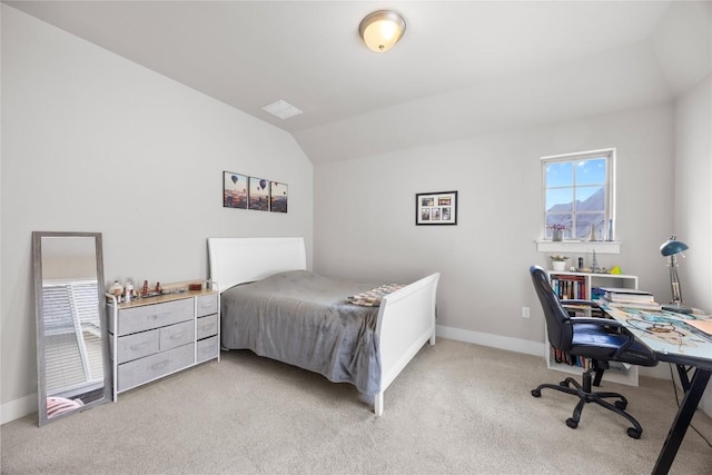 13001 Hymeadow Dr Unit 12, Austin, TX 78729 - bedroom featuring light colored carpet, a desk, baseboards, and lofted ceiling