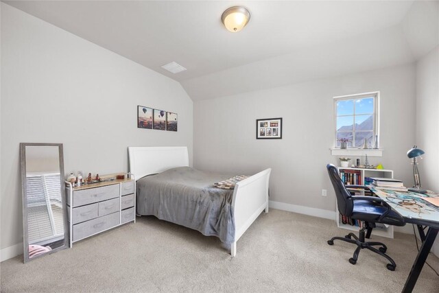 13001 Hymeadow Dr Unit 12, Austin, TX 78729 - bedroom featuring light carpet, a desk, baseboards, and lofted ceiling
