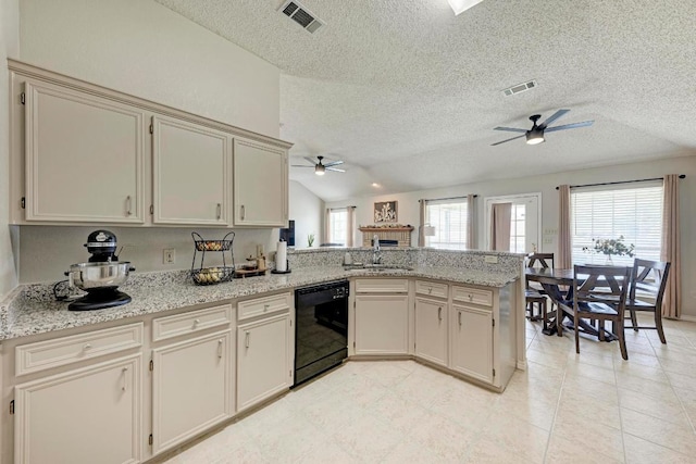 602 Totem Trl, Harker Heights, TX 76548 - kitchen featuring black dishwasher, ceiling fan, a textured ceiling, a peninsula, and vaulted ceiling