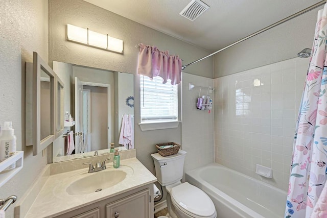 602 Totem Trl, Harker Heights, TX 76548 - bathroom featuring vanity, shower / bath combination with curtain, and a textured wall