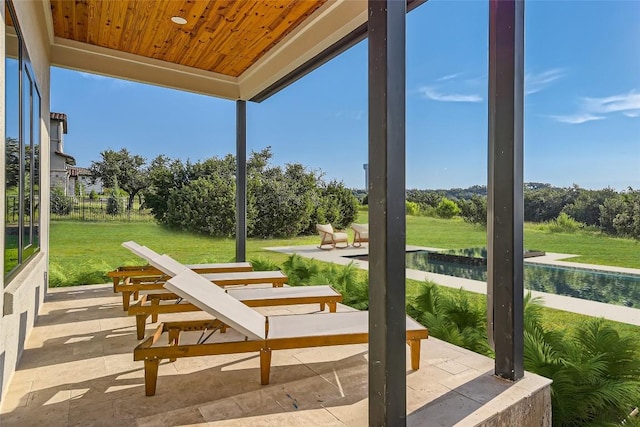 view of patio / terrace with an outdoor pool