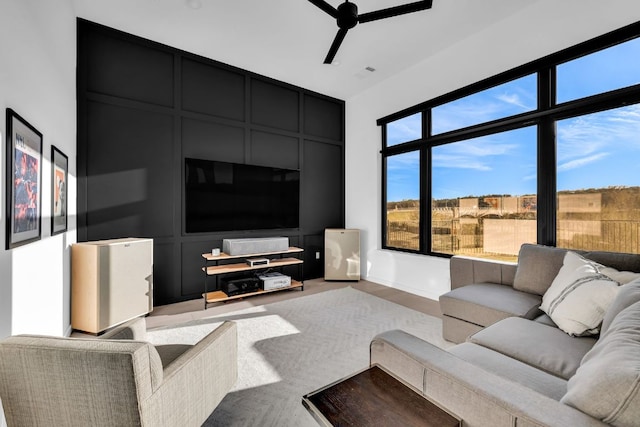 420 Waters Edge Cv, Dripping Springs, TX 78620 - living room with baseboards, a ceiling fan, visible vents, and light wood-style floors