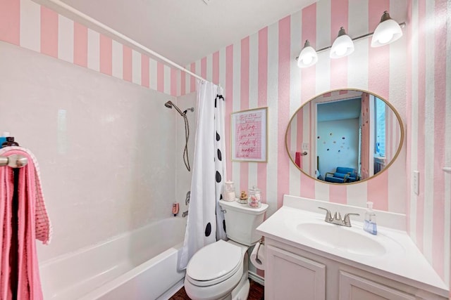 117 Easy St, Hutto, TX 78634 - full bathroom featuring wallpapered walls, shower / bath combo with shower curtain, vanity, and toilet