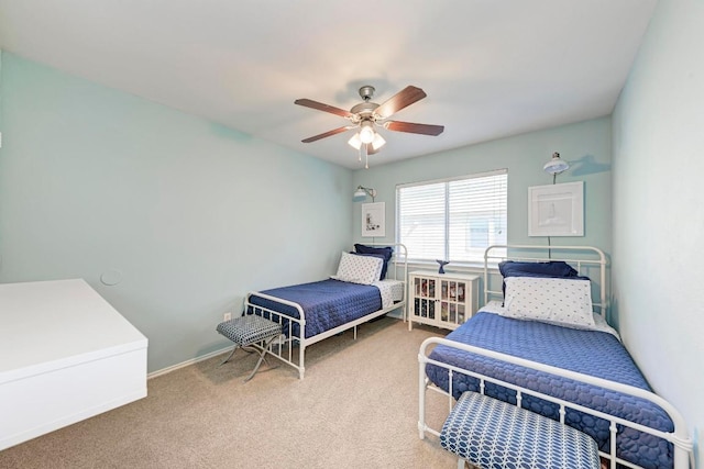 117 Easy St, Hutto, TX 78634 - carpeted bedroom with a ceiling fan and baseboards