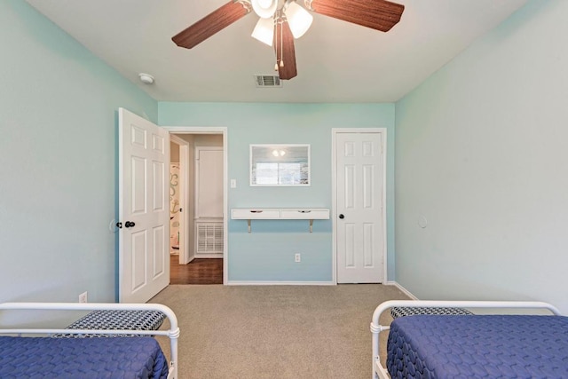 117 Easy St, Hutto, TX 78634 - bedroom with carpet, a ceiling fan, and baseboards