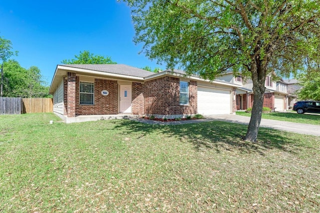 117 Easy St, Hutto, TX 78634 - view of front facade with brick siding, a garage, and driveway
