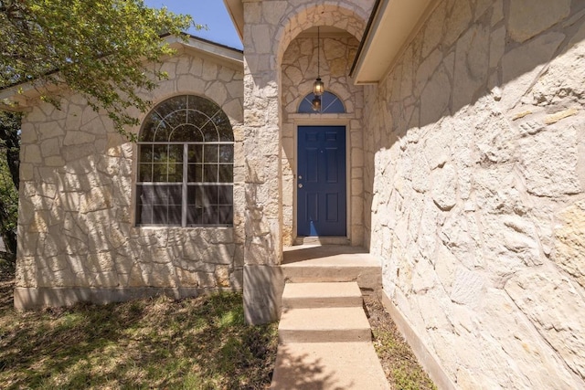 2300 Nevins Cv, Lago Vista, TX 78645 - property entrance featuring stone siding