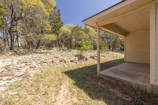 2300 Nevins Cv, Lago Vista, TX 78645 - view of yard with a patio