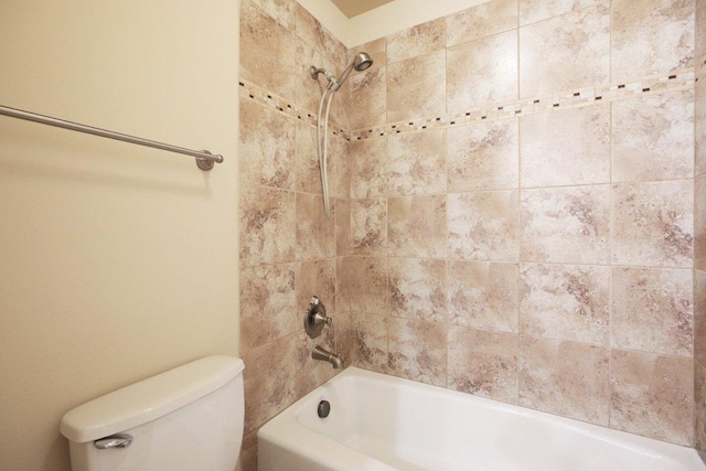 full bathroom with shower / bath combination and toilet