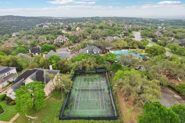 birds eye view of property with a residential view