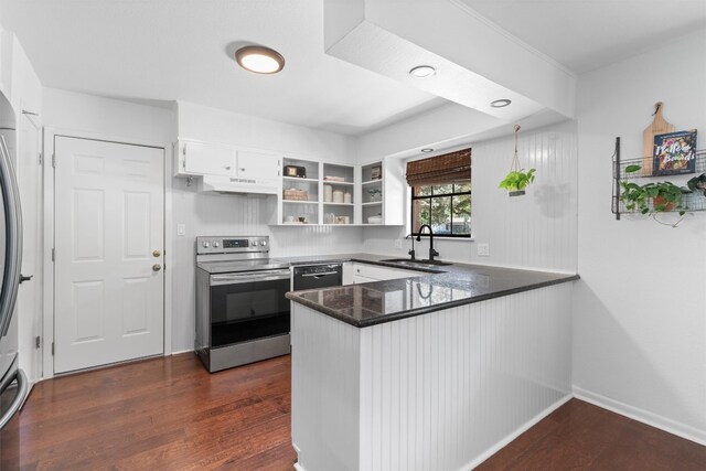 1604 Robb Ln, Round Rock, TX 78664 - kitchen featuring open shelves, a sink, a peninsula, electric stove, and dark wood-type flooring