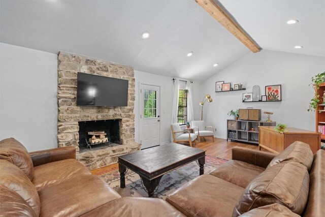 1604 Robb Ln, Round Rock, TX 78664 - living area with baseboards, recessed lighting, a fireplace, vaulted ceiling with beams, and wood finished floors