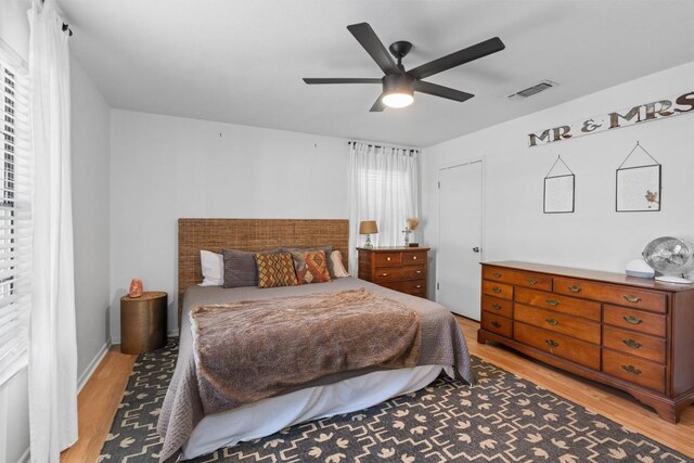 1604 Robb Ln, Round Rock, TX 78664 - bedroom featuring visible vents, a ceiling fan, and light wood-style flooring