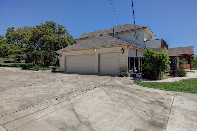 200 Matzig Cv, Buda, TX 78610 - view of front of house featuring concrete driveway and an attached garage