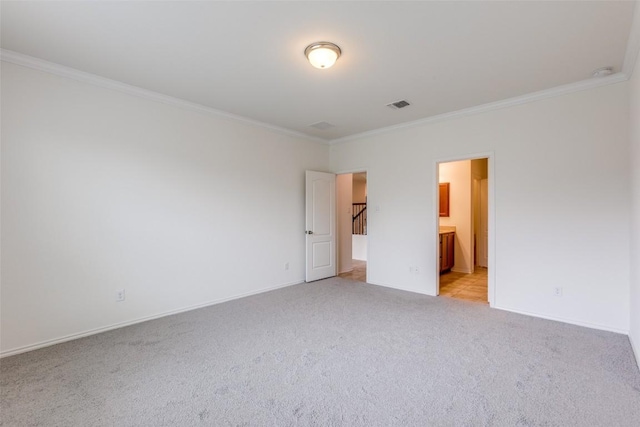 339 Alamosa Dr, Georgetown, TX 78626 - unfurnished bedroom with crown molding, light colored carpet, and connected bathroom