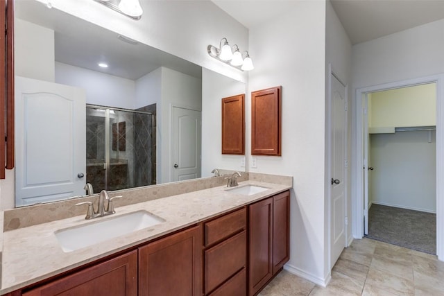 339 Alamosa Dr, Georgetown, TX 78626 - full bath with a stall shower, double vanity, and tile patterned floors
