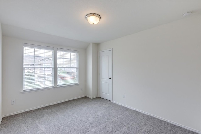 339 Alamosa Dr, Georgetown, TX 78626 - carpeted empty room featuring baseboards and a smoke detector